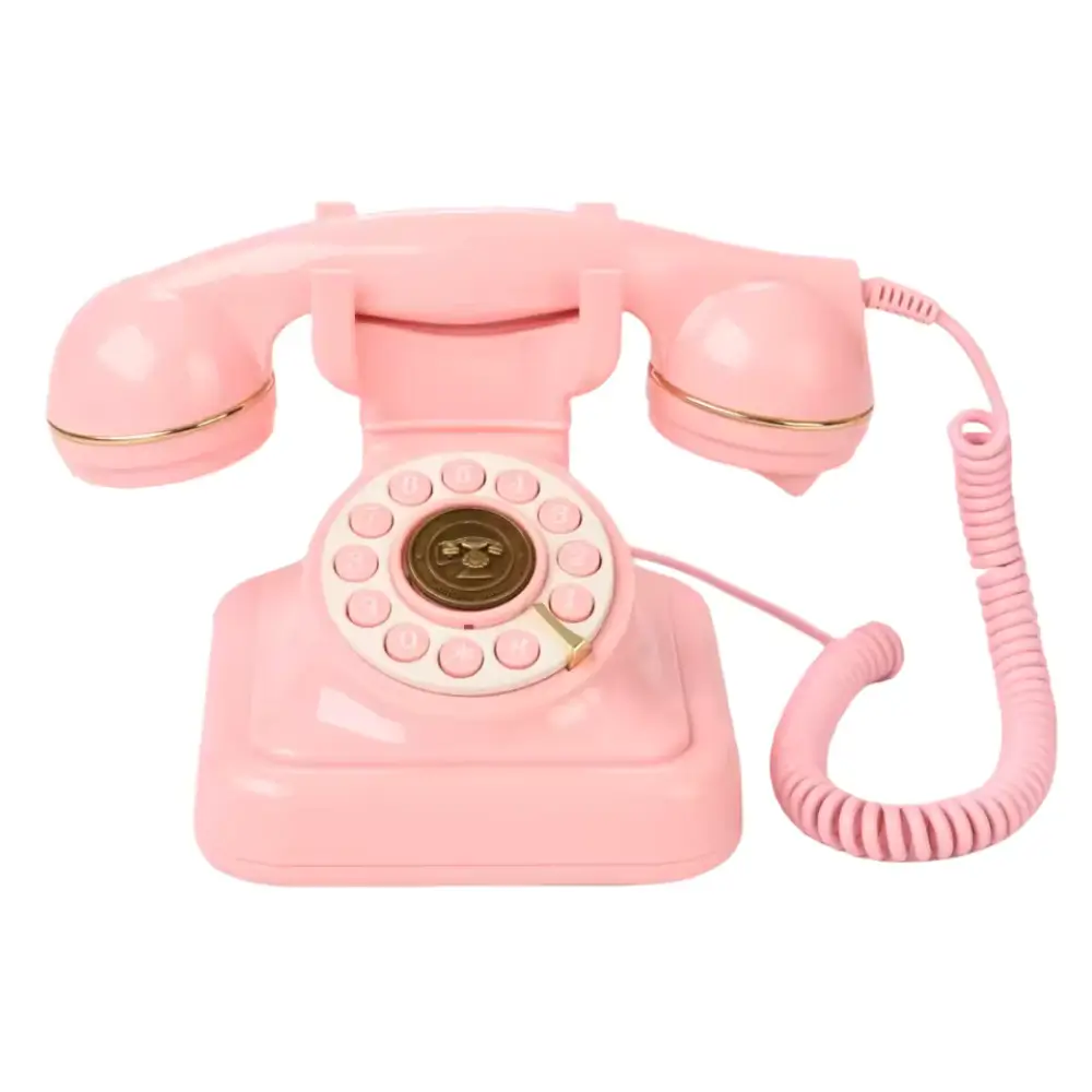 Téléphone livre d'or rose vintage